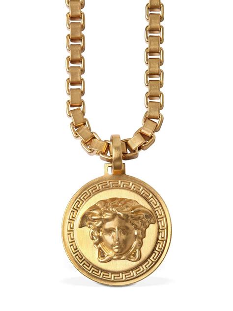 versace medusa coin pendant.